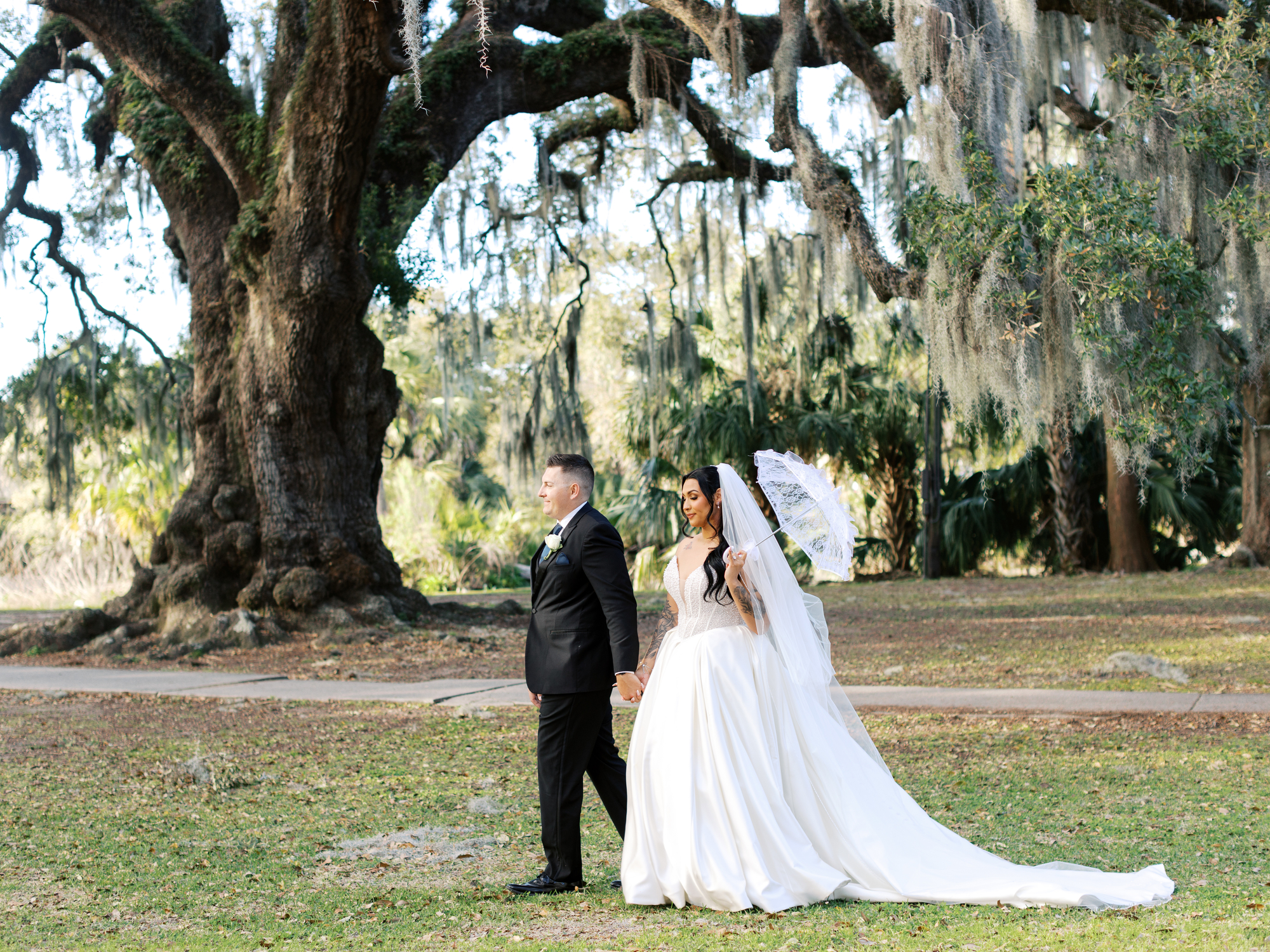 Gabrielle & Tyler's City Park Micro Wedding | New Orleans Wedding Photography 27 Micro wedding portraits with parasols City Park