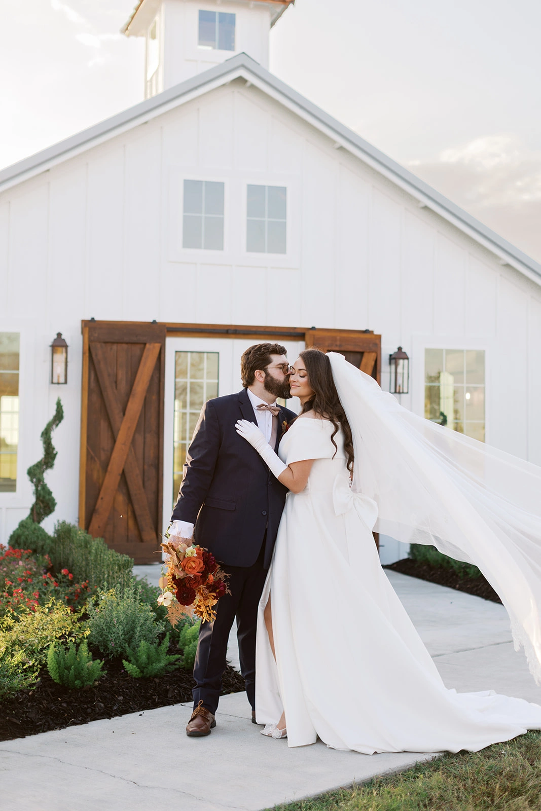 Wedding Portrait in front of the chapel at Le Magasin Roullier